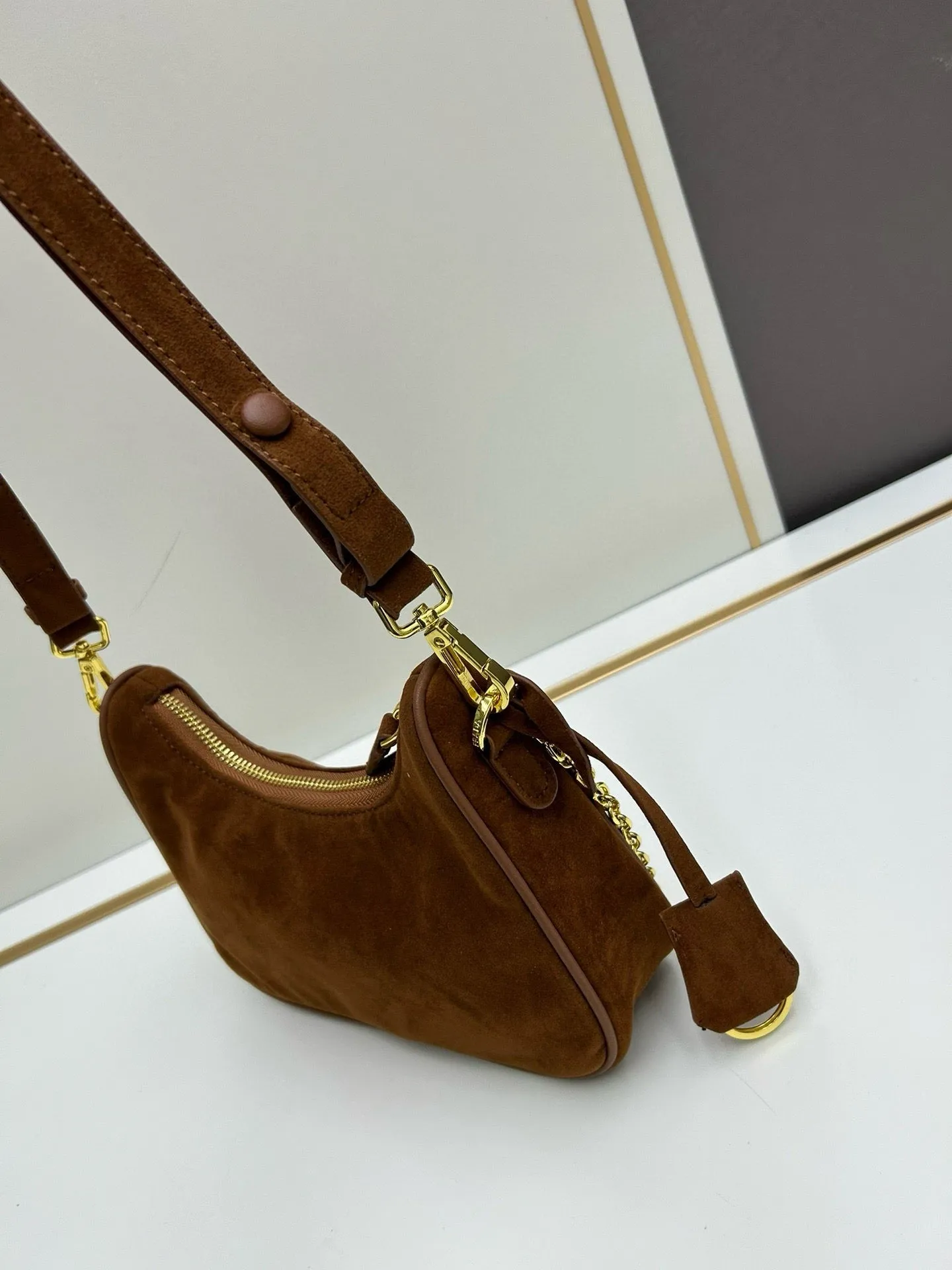 P Re-Edition Suede Mini Bag