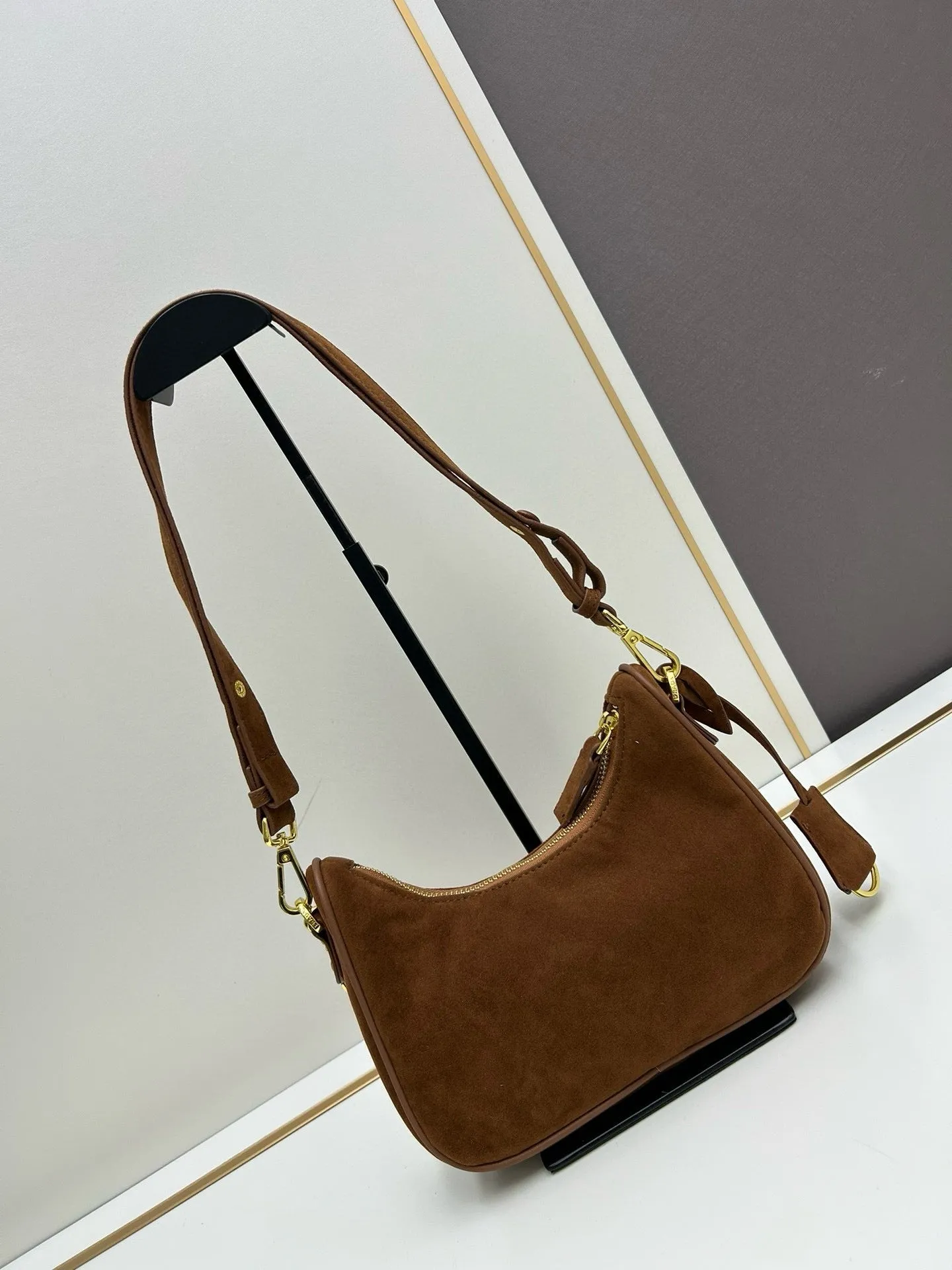 P Re-Edition Suede Mini Bag
