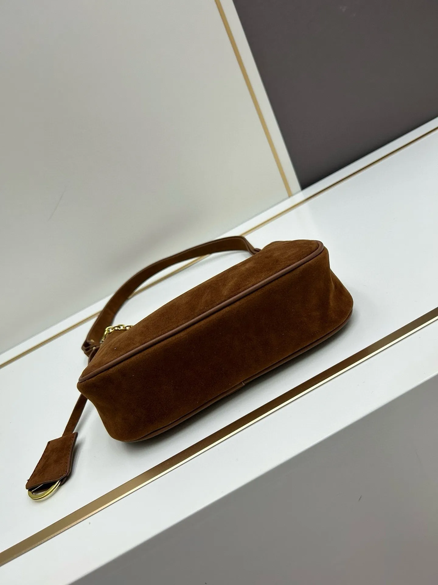 P Re-Edition Suede Mini Bag