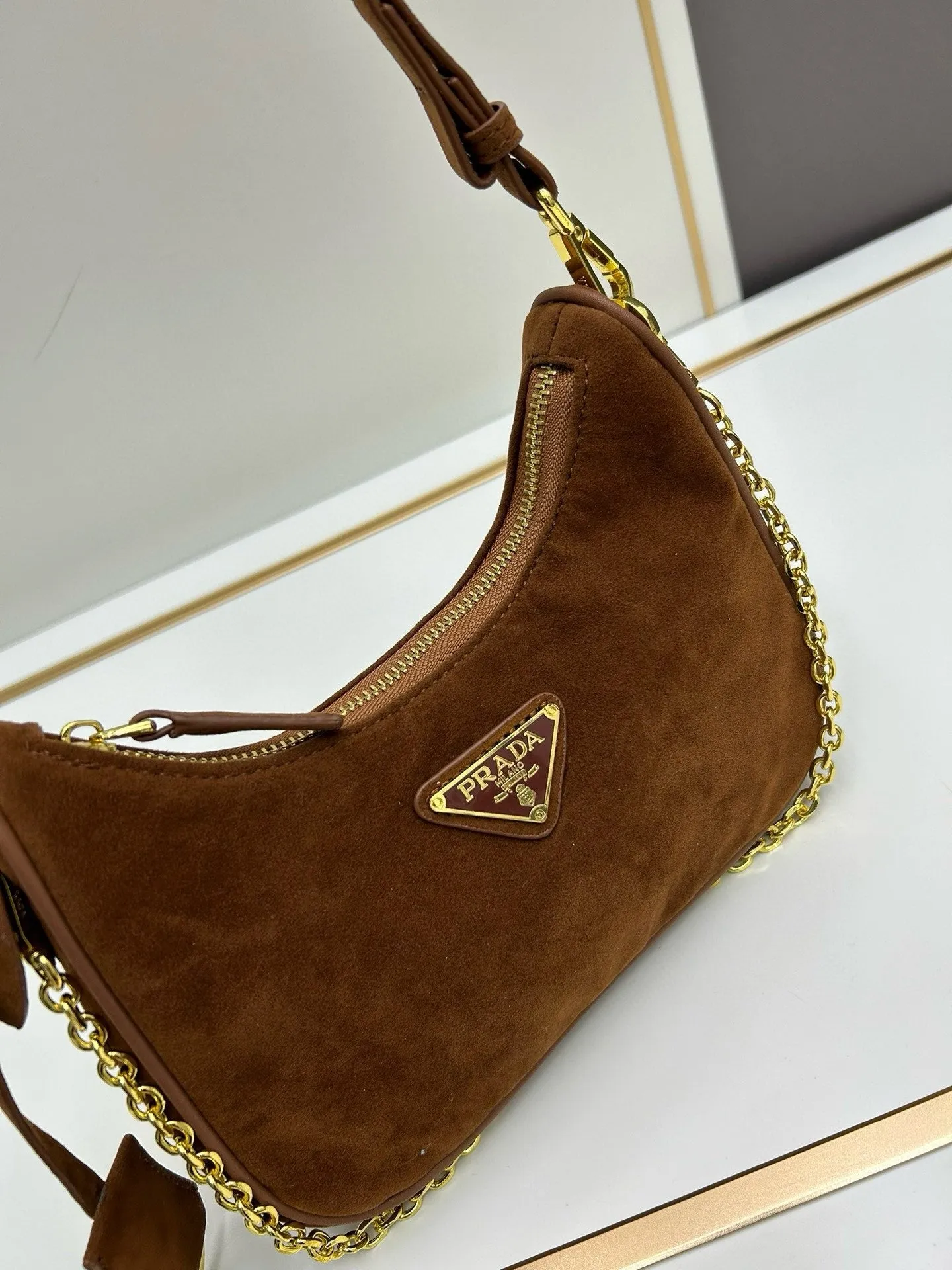 P Re-Edition Suede Mini Bag